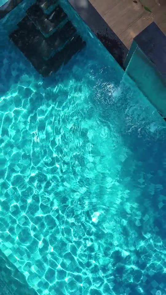 Pool spillover with crystal clear water